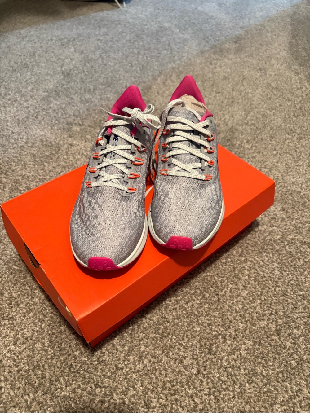 Nike Women's Gray Sneakers with Pink and Orange Accents